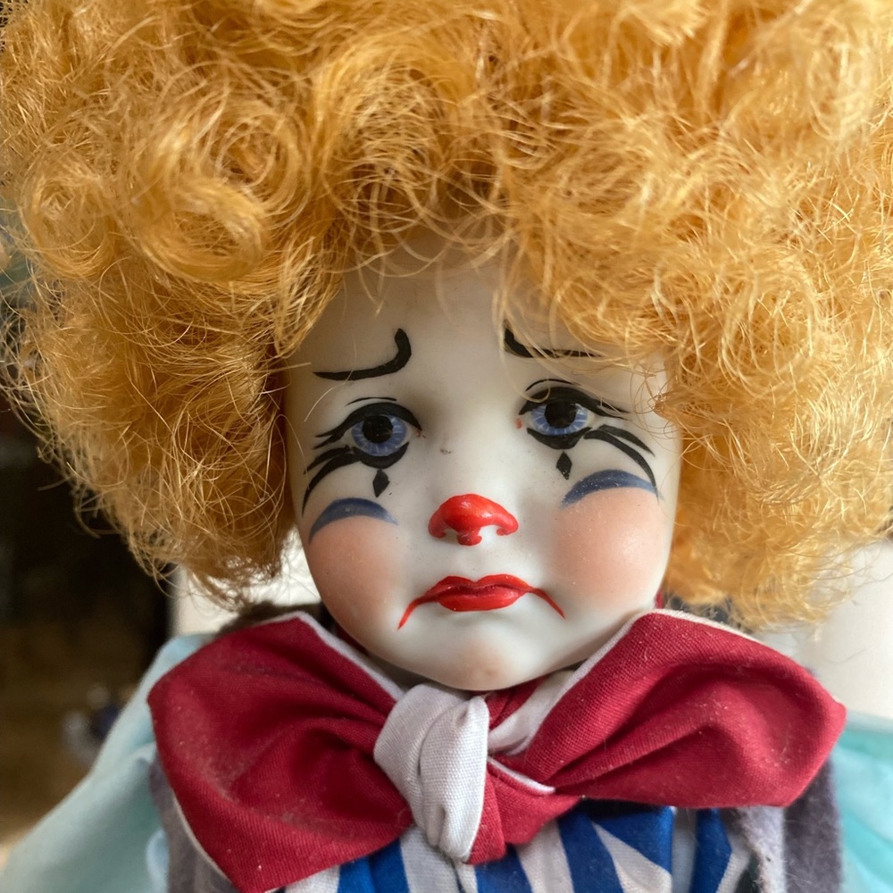 Porcelain clown doll
